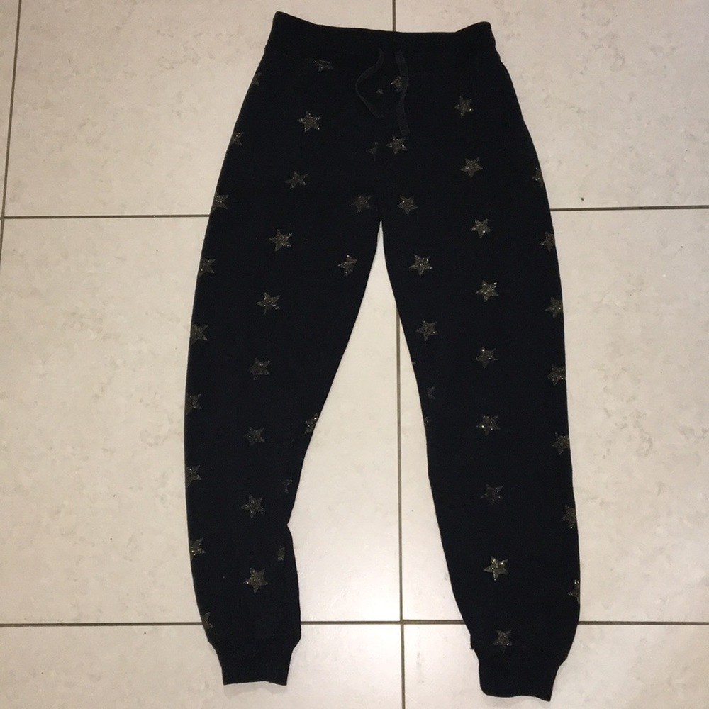 Elastic waistband with drawstring has gold stars